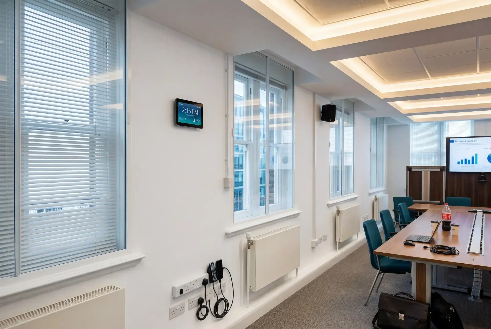 Commercial meeting room with a run of windows fitted with secondary glazing for acoustic and thermal control